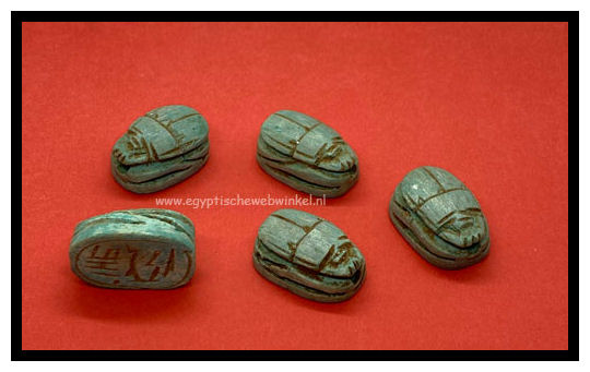 Small turquoise scarabs